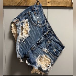 Lace pocket distressed AE jean shorts
